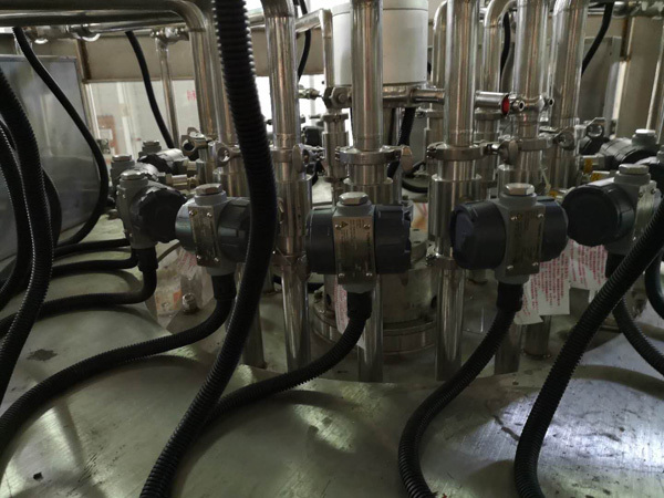 美国控制涡轮冈本视频软件APP下载在桶装水定量灌装机中的应用